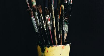 Photo by Basar Dogan on Unsplash (https://unsplash.com/photos/paint-brushes-in-yellow-plastic-cup-uVBf0tuP1gE)
