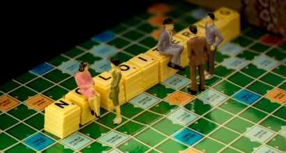 Photo by Hassan Pasha on Unsplash (https://unsplash.com/photos/3-men-in-gray-suit-standing-beside-yellow-lego-blocks-4PC2PPm9s2E)