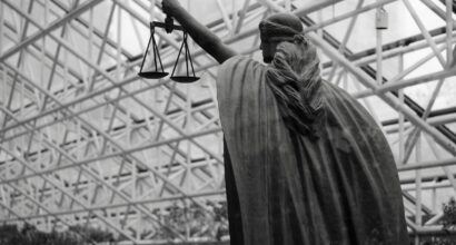 Photo by Albert Stoynov on Unsplash (https://unsplash.com/photos/statue-of-lady-justice-holding-scales-indoors-kIM48Mpp9iY)