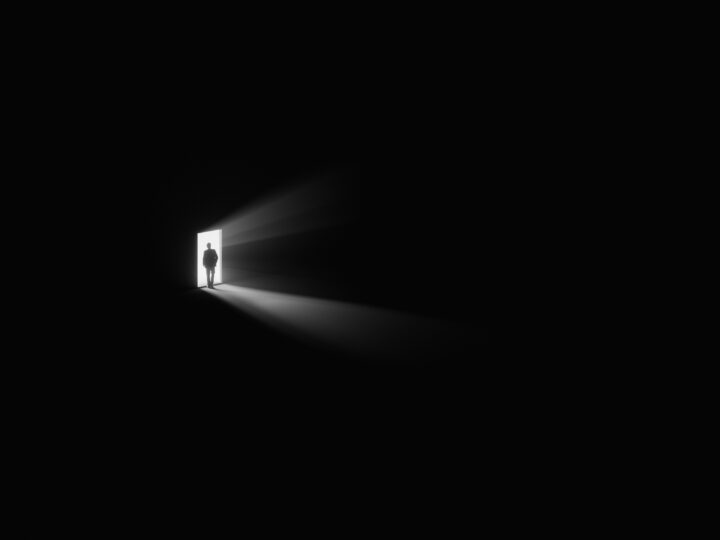 Photo by Viktor Forgacs on Unsplash (https://unsplash.com/photos/a-person-standing-in-a-doorway-with-a-light-coming-through-it-iDF0FXUxGhE)