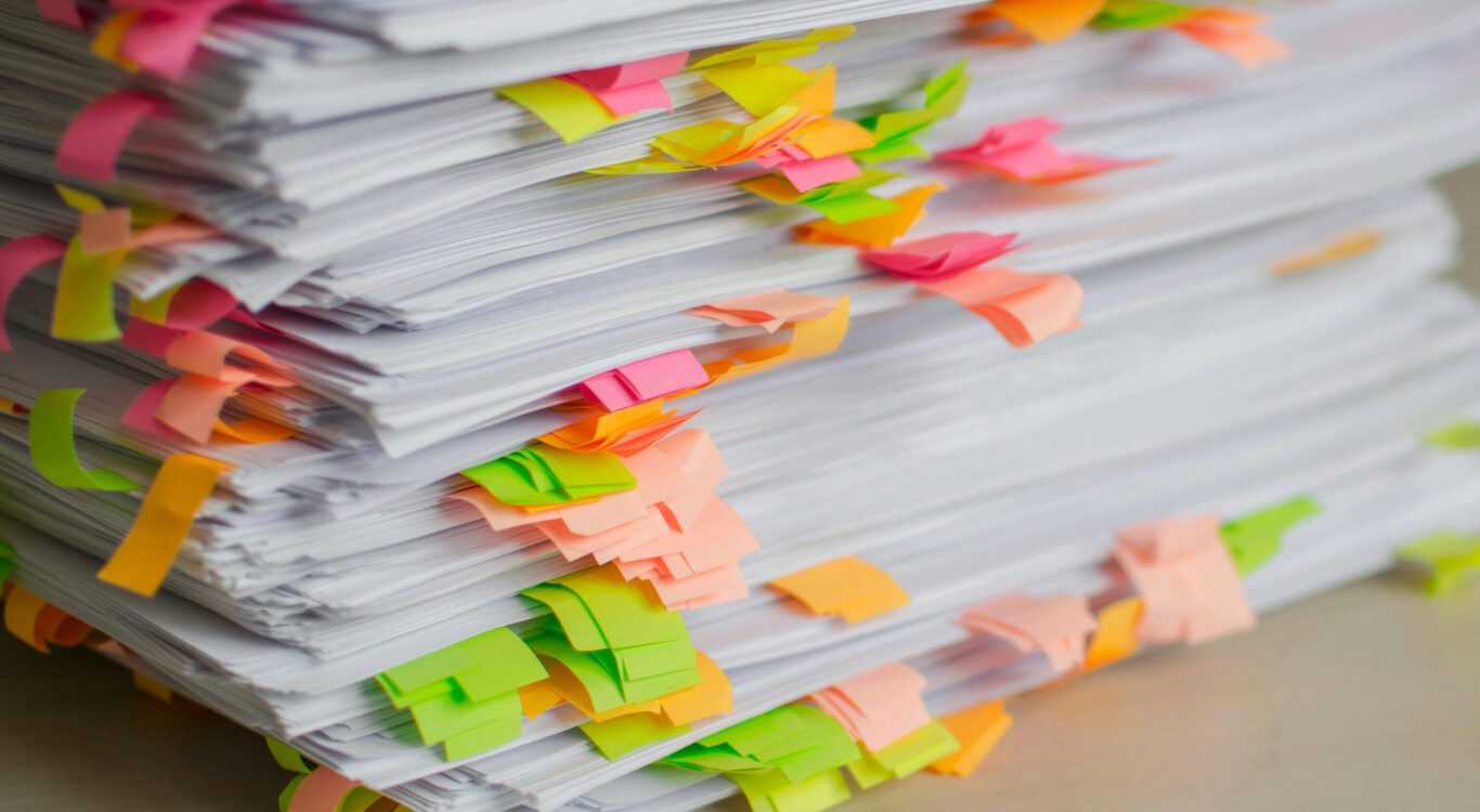 Photo of a pile of documents.
