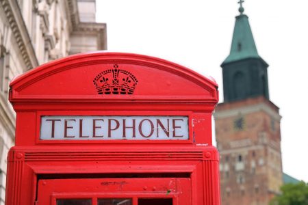 A recent report suggests English and Finnish can coexist in Finland, and that the prospect of returning to a bilingual Finland is as unlikely as reverting to the era of telephone boxes. “Coexistence” by Antti Suomela. CC BY-SA 4.0. Derivative of works under public domain.