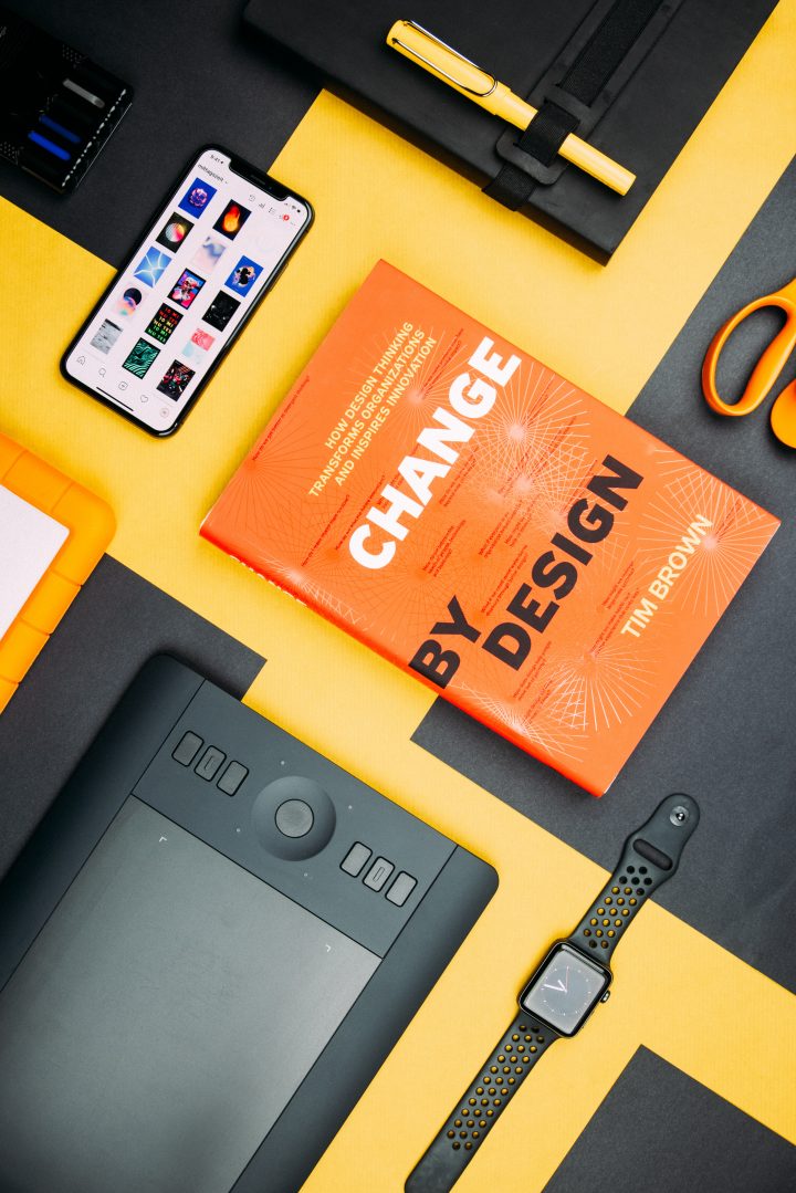 Photo by Krisztian Tabori (https://unsplash.com/@ktabori) on Unsplash (https://unsplash.com/photos/change-by-design-by-tim-brown-book-beside-smartphone-IyaNci0CyRk)