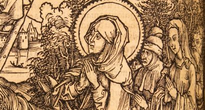 Heliga Birgitta ber och hennes huvud är omgivet av en gloria.