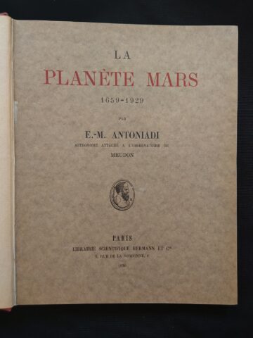 Title page of the book. The title is printed in red other information on black.