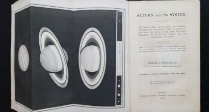 Title page of the book and an appendix page folded open presenting Saturn.