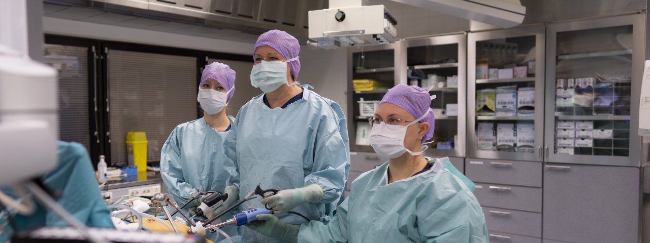 Surgeons doing an operation