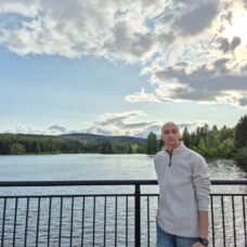 Picture of Mahdi in front of a lake