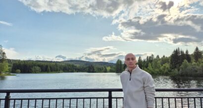 Picture of Mahdi in front of a lake