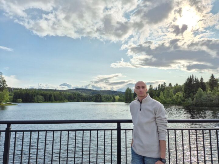 Picture of Mahdi in front of a lake
